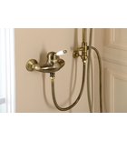 Photo: KIRKÉ WHITE Wall mounted shower mixer tap lever white, bronze